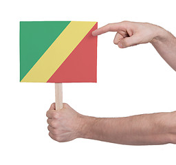 Image showing Hand holding small card - Flag of Congo