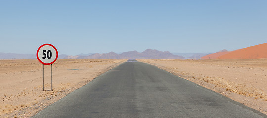 Image showing Speed limit sign at a desert road in Namibia