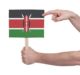 Image showing Hand holding small card - Flag of Kenya