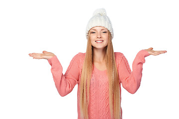 Image showing Winter girl holding copy space on her palms