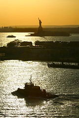 Image showing Boats sailing next to Libery Statue