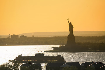 Image showing Ship next to Statue of Liberty