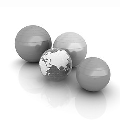 Image showing Pilates fitness ball and earth