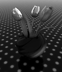 Image showing Tulips with leaf in vase