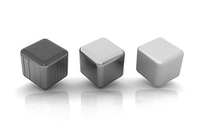 Image showing set of all metal cubes of gold, black gold, pink plastic