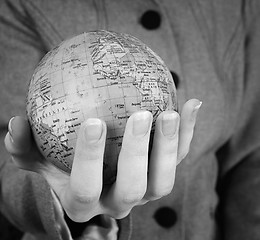 Image showing Globe in a girl's hands