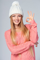 Image showing Christmas girl gesturing OK sign