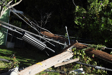 Image showing power poles after auto crash