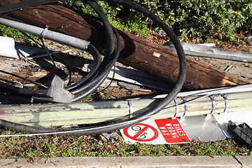 Image showing phone and light pole after accident