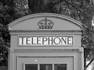 Image showing Black and white Red phone box in London