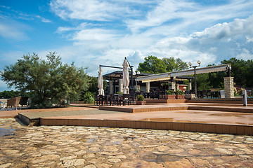 Image showing modern wicker furniture in street restaurant 