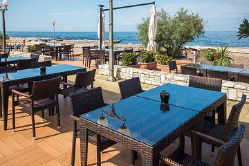 Image showing modern wicker furniture in street restaurant 