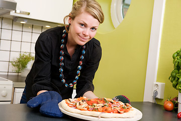 Image showing Woman with Fresh Pizza