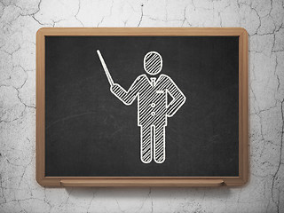 Image showing Studying concept: Teacher on chalkboard background