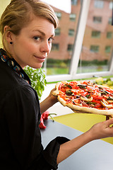 Image showing Young Woman with Fresh Pizza