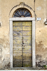 Image showing abstract cross    closed wood door    italy azzate