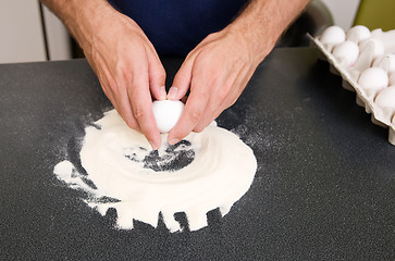 Image showing Making Pasta - Cracking the Egg