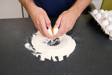 Image showing Making Pasta - Cracking the Egg