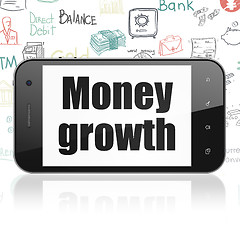 Image showing Banking concept: Smartphone with Money Growth on display