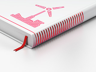 Image showing Industry concept: closed book, Windmill on white background