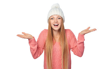 Image showing Excited surprised winter girl