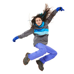 Image showing Winter woman jumping