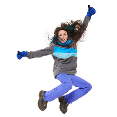 Image showing Winter woman jumping