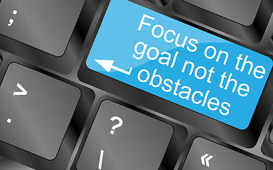Image showing Focus on the goal not the obstacles. Computer keyboard keys with quote button. Inspirational motivational quote. Simple trendy design