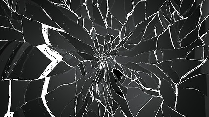 Image showing Shattered and cracked glass on white