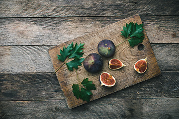 Image showing Tasty Figs on chopping board