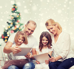 Image showing happy family with tablet pc computers at home