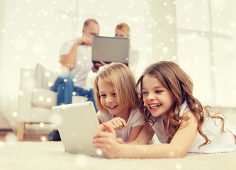 Image showing happy family with tablet pc computers