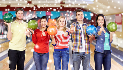 Image showing happy friends in bowling club at winter season