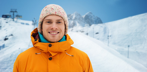 Image showing happy young man in winter clothes outdoors