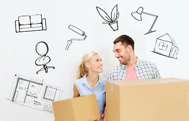 Image showing couple with delivery boxes moving to new home