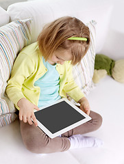 Image showing little girl with tablet computer at home