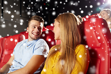 Image showing happy couple watching movie in theater