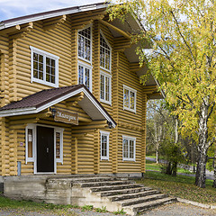 Image showing Entrance of old style log house in country