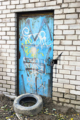 Image showing Old door with scribbles