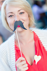 Image showing Woman with fake mustache.