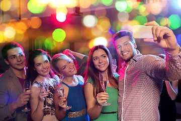 Image showing friends with glasses and smartphone in club