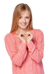 Image showing Smiling female showing heart with hands