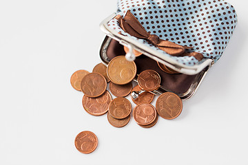 Image showing close up of euro coins and wallet on table