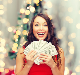 Image showing woman in red dress with us dollar money