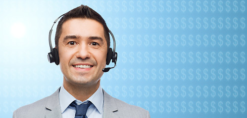 Image showing businessman in headset over dollar currency symbol