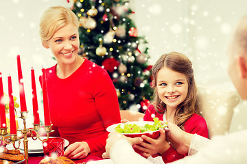 Image showing smiling family having holiday dinner at home