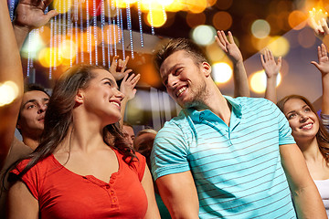 Image showing happy couple having fun at music concert in club