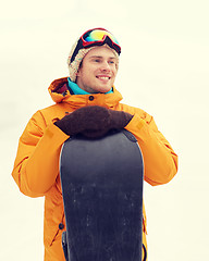 Image showing happy young man in ski goggles outdoors