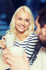 Image showing happy couple meeting and drinking tea or coffee