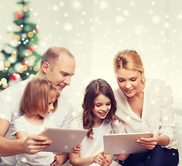 Image showing happy family with tablet pc computers at home